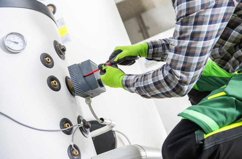Expert technician performing professional boiler repair