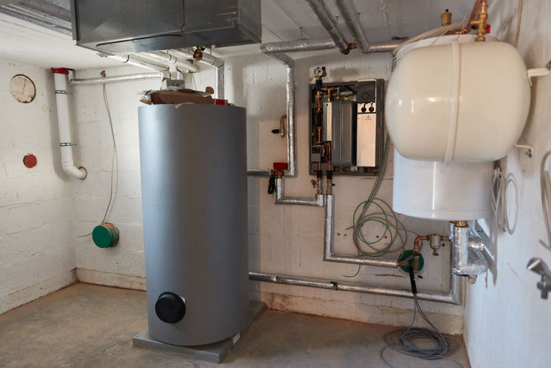 Stainless steel boiler tank with insulation and pipes