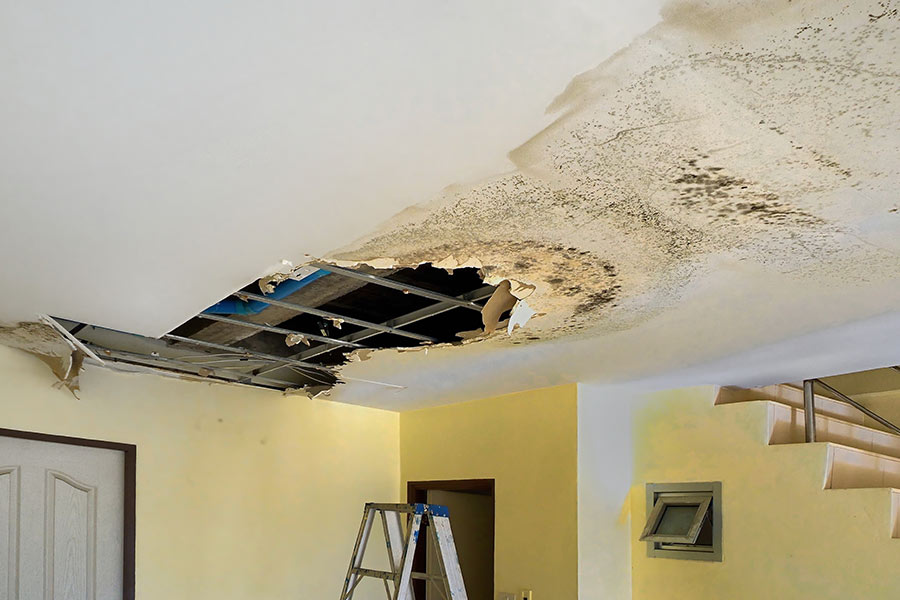 Severely water-damaged ceiling