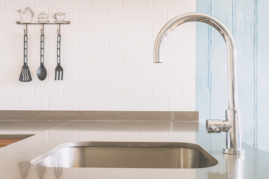 Modern kitchen sink with faucet