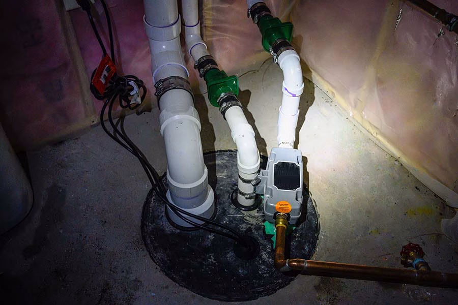 Installed sump pump pit with backup pump