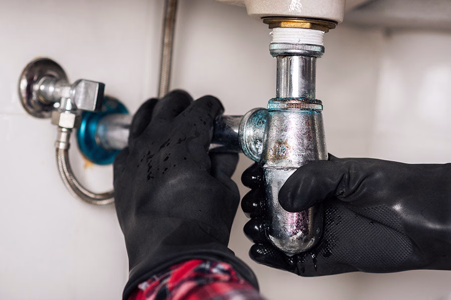 Plumbing pipe repair in progress